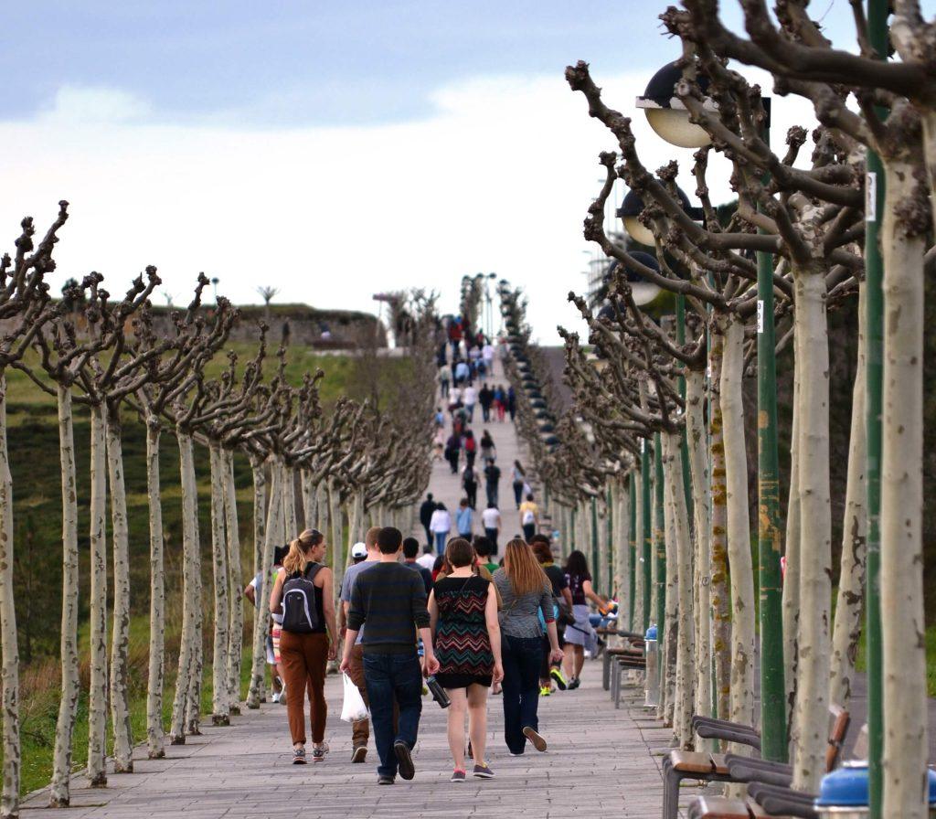 Group of people walking in Punta Galea